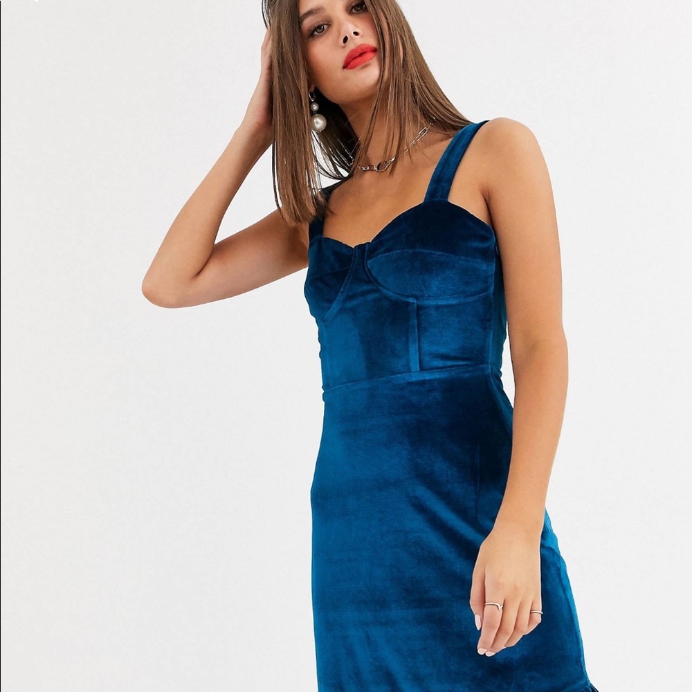 Fashion Union Tall ruffle hem mini dress with built up strap
in blue velvet